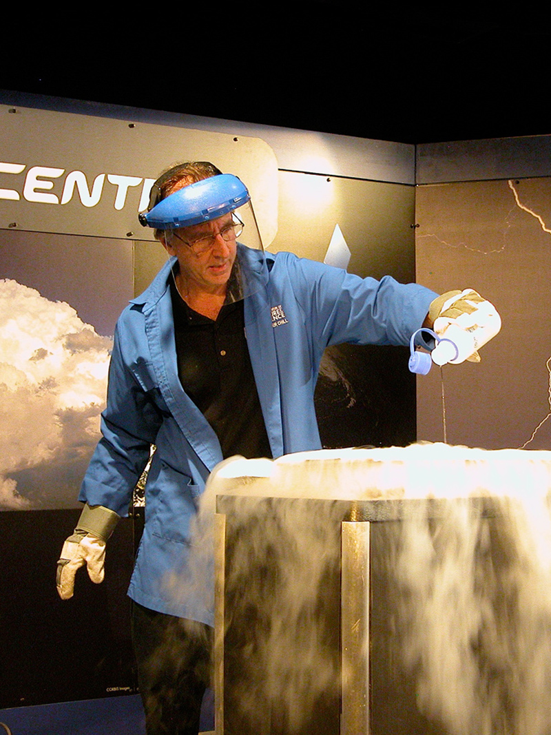 Eddie Goldstein making a cloud with liquid nitrogen in a science demonstration about weather